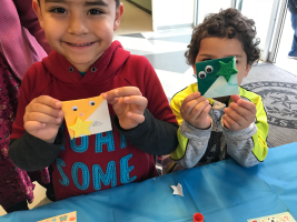 BiblioTech patrons showing off their crafts