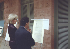 Tracy Wolff and Judge Phil Kazen reviewing historic documents of the County Clerk's Office