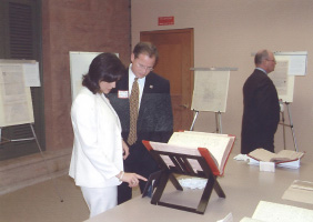 Contributors to the Courthouse Restoration reviewing historic documents from the County Clerk's Office